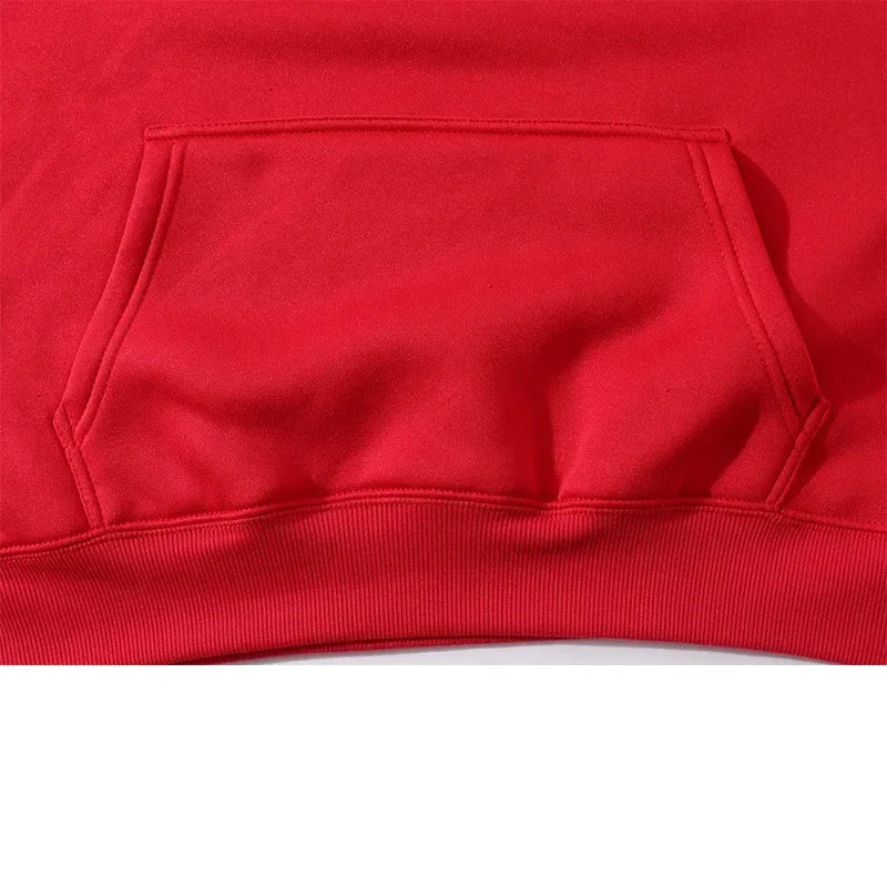 .A casual sports outfit consisting of a long-sleeved hooded t-shirt and elastic-waist pants.